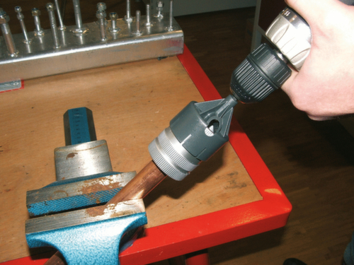 Adapter voor pijpontbramer